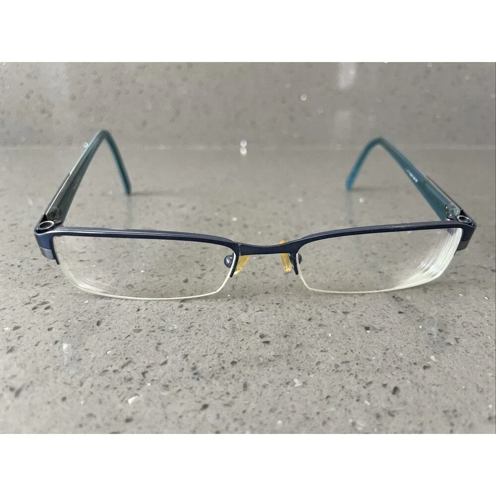 Takumi Eyeglasses 53-18-135 50 Patented Technology FRAMES Only Blue half rim